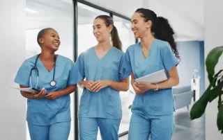 female healthcare nurses together at work in a hospital