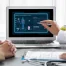 Doctor meeting with a patient using AI to help diagnose.